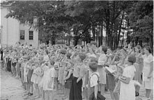 a an entire school pledges allegiance